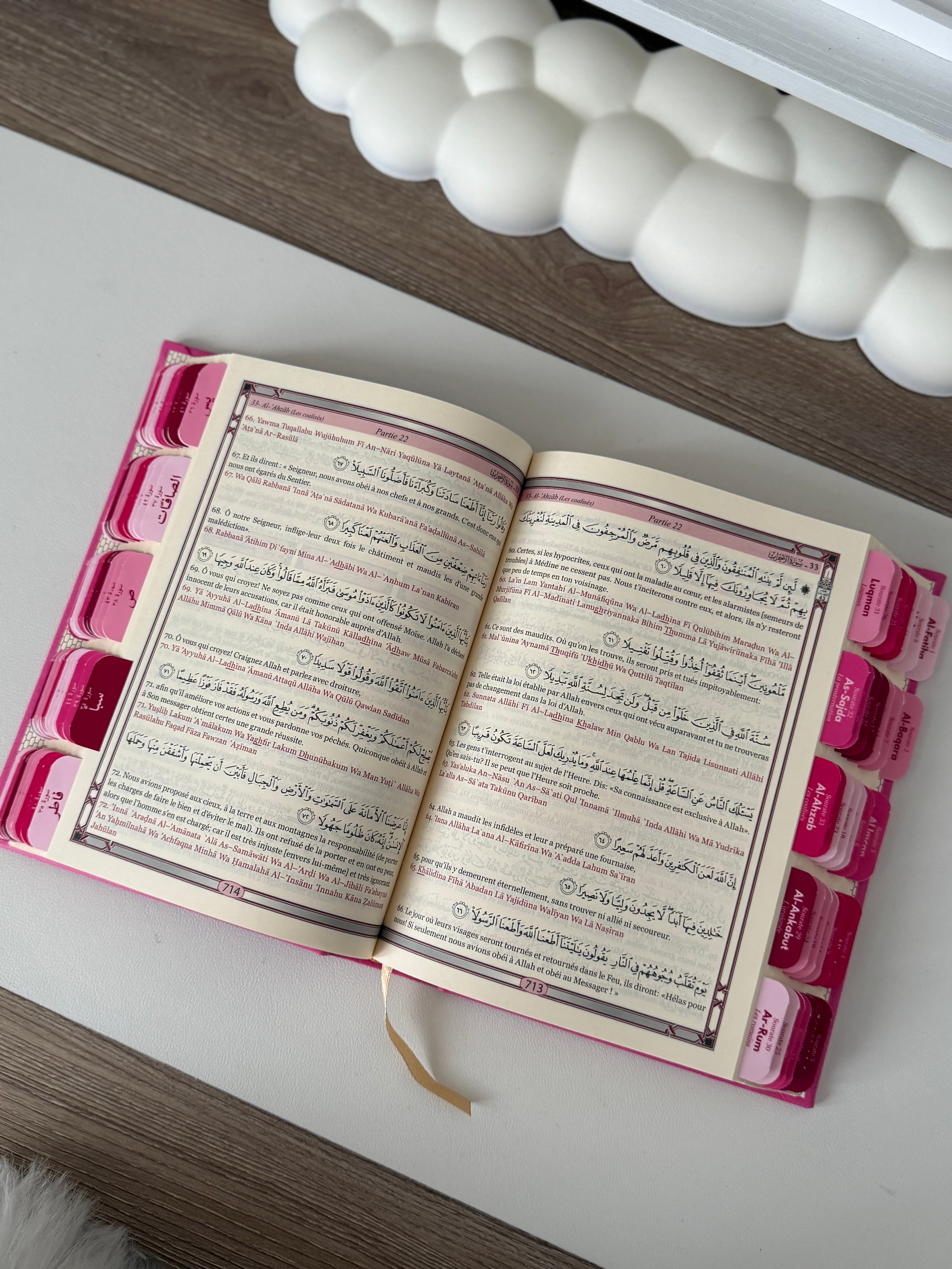 Quran with raspberry tabs